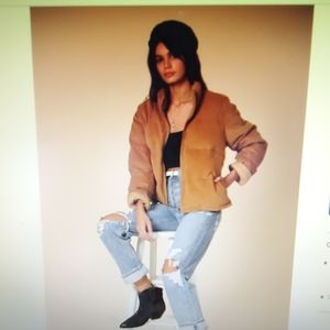 Zip up puffy corduroy jacket.